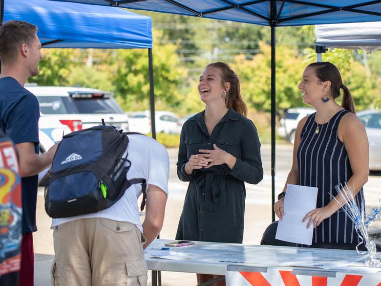 Students talk about clubs and organizations at the annual Back to School Bash